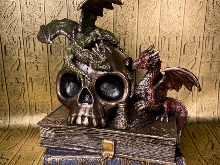 Dragonlings on Skull and Books on Sale